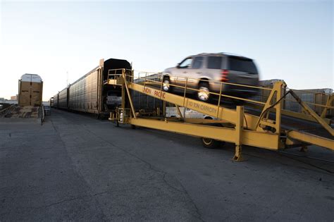 moving a car by train.